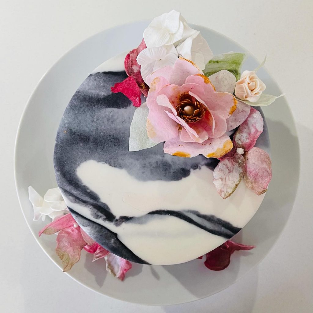 Black and white fondant with wafer paper flowers