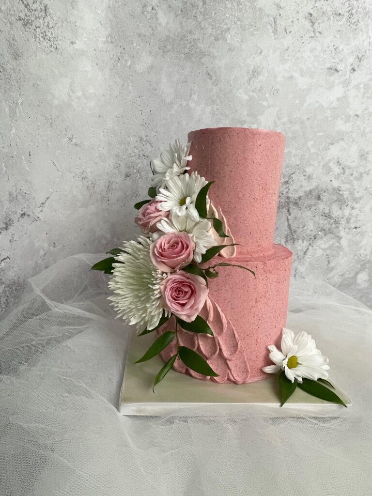 Raspberry buttercream with Citrus cake and fresh flowers