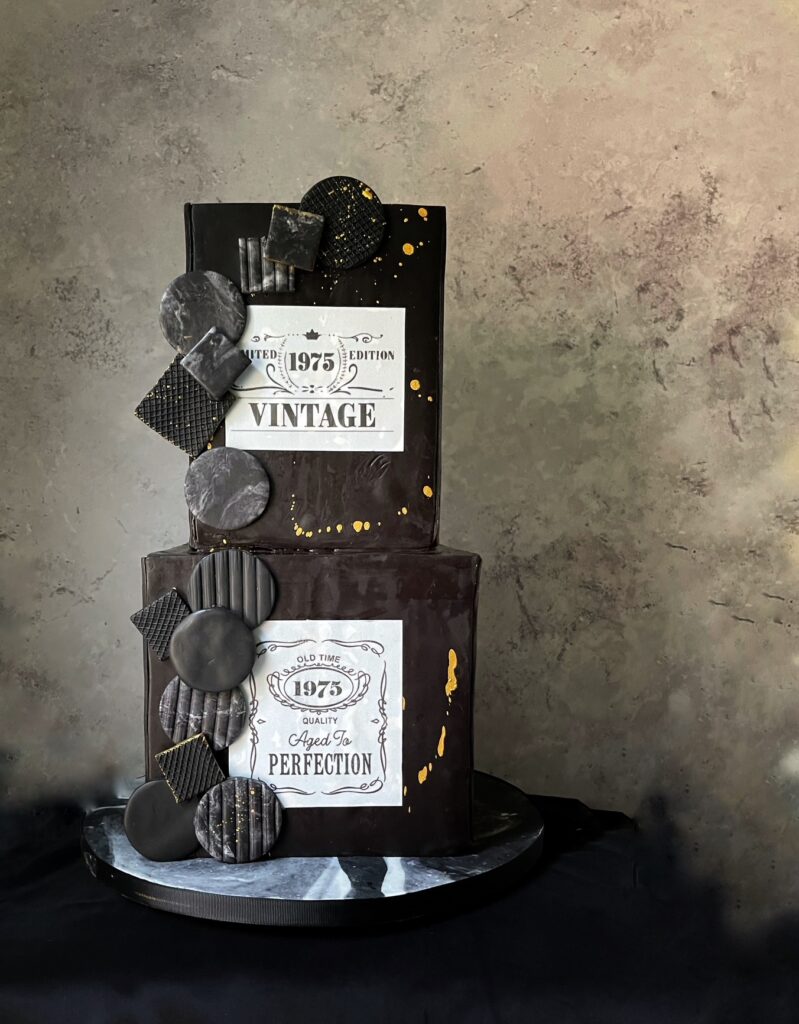 Black manly cake. Square Cake with black fondant. Whisky cake.